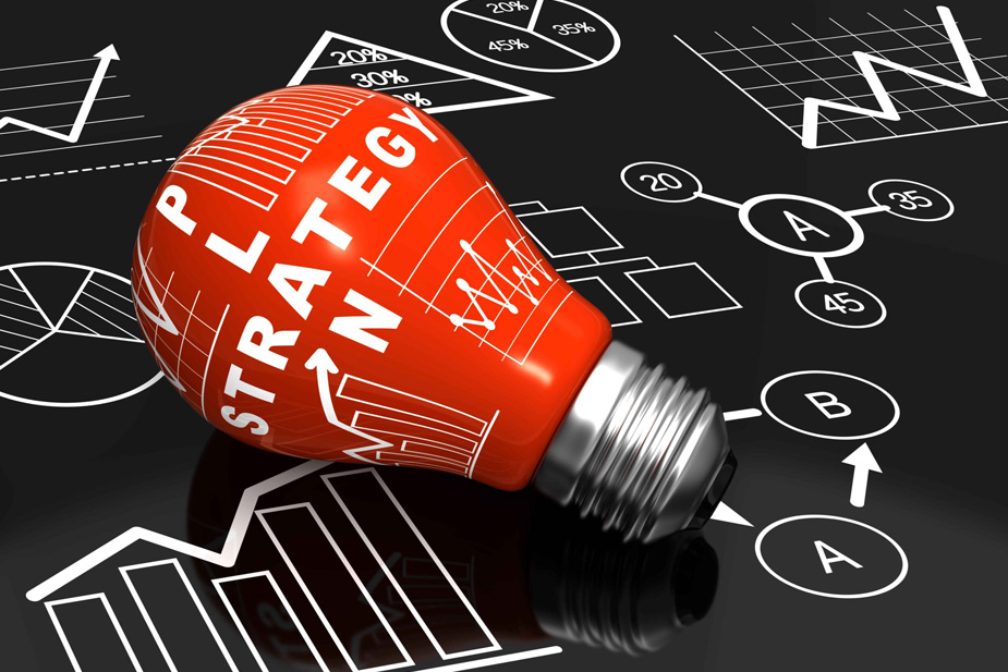 illustration of a lightbulb with Plan Strategy written on it lying on a background of different graph types